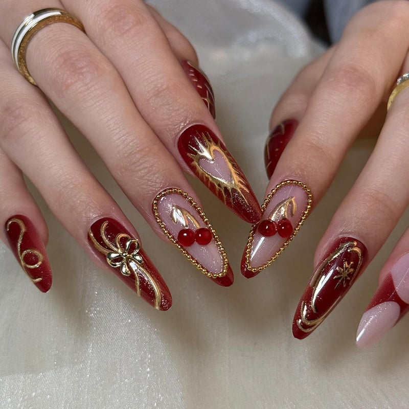 SEENEEY Valentines Long Press on Nails Almond Fake Nails Red Artificial Nail with Cherry and Gold Charm Designs Love Heart Christmas Stick on Nail for Women 30pcs - Image 1